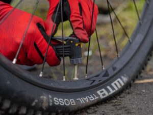 Flip Your Bike, Deflate the Tire, and Loosen the Bead