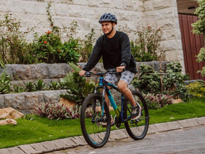 Riding a leisure mountain bike around the town