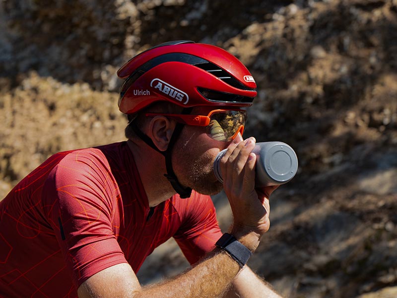 A professional cyclist sipped water from his Elite Bottle during his ride