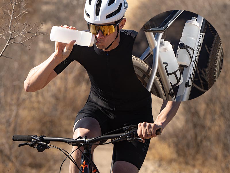 A road biker carrying two Elite Bottle and sipped from one bottle during his ride