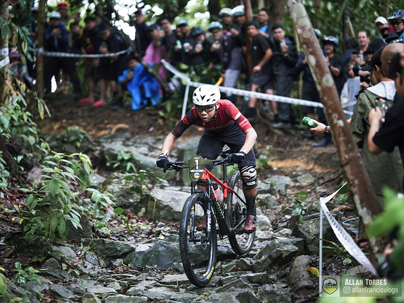 A Singapore Open Enduro 2025 Participant cruising on a rough trail