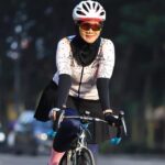 A cyclist enjoying her cycling adventure during Ramadhan