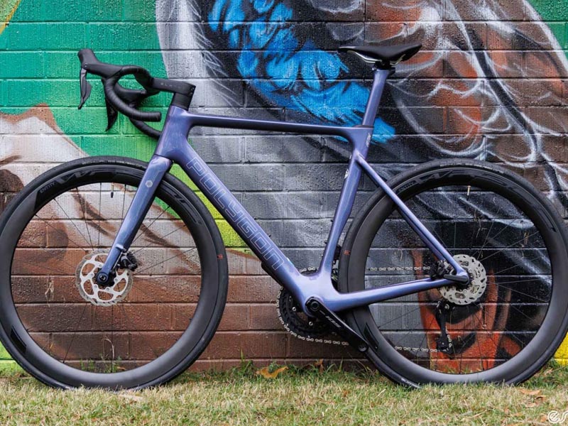A road bike is parked after a ride