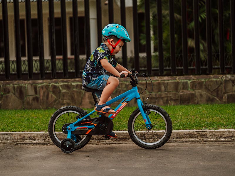 Enjoying an adventure with a training wheel bike